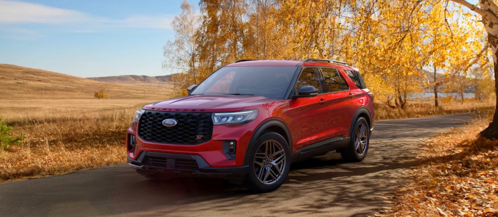 A 2026 Ford Explorer going down an autumn path in New Hudson, MI