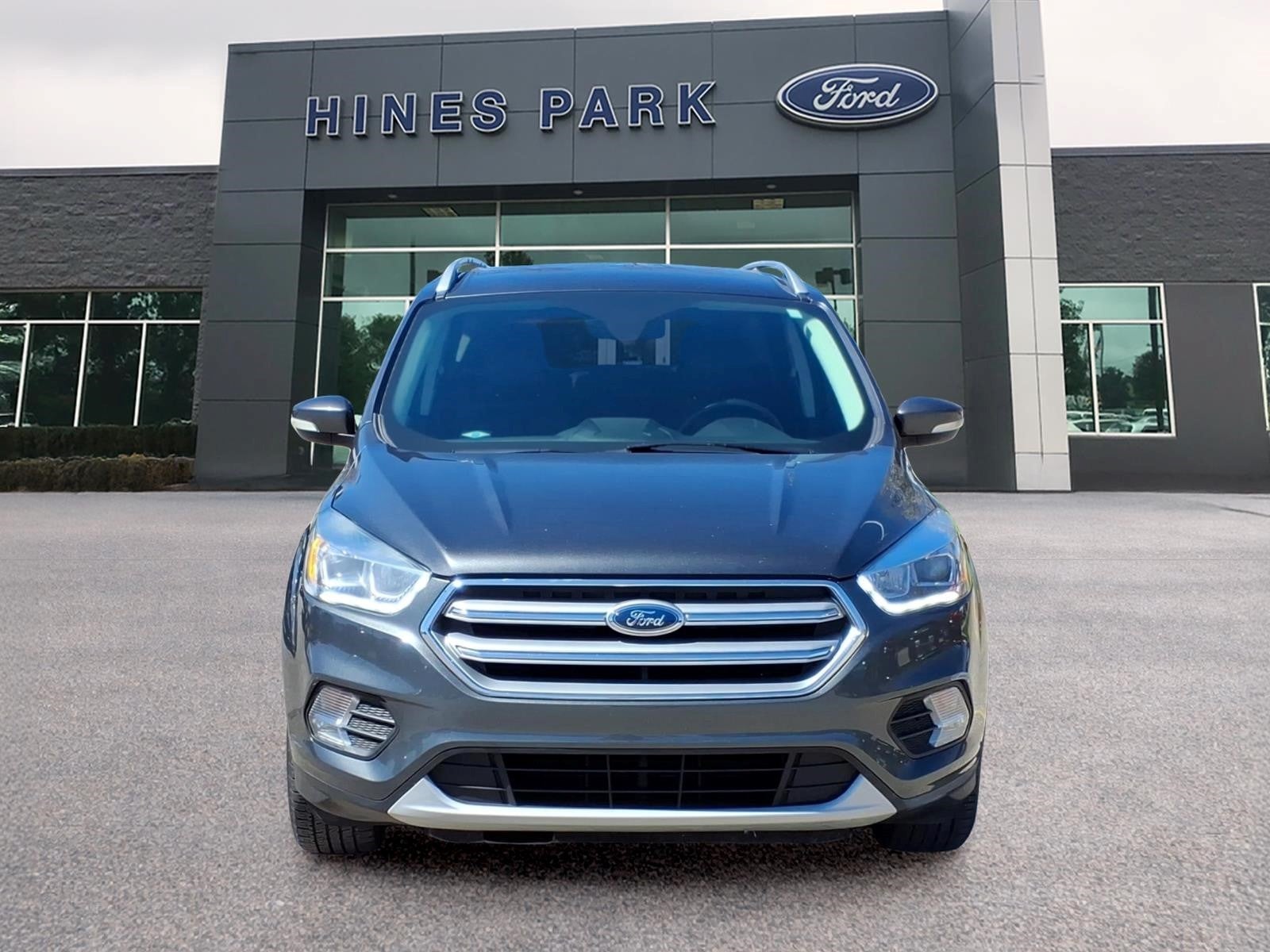 Used 2017 Ford Escape Titanium with VIN 1FMCU0JD8HUC63517 for sale in New Hudson, MI