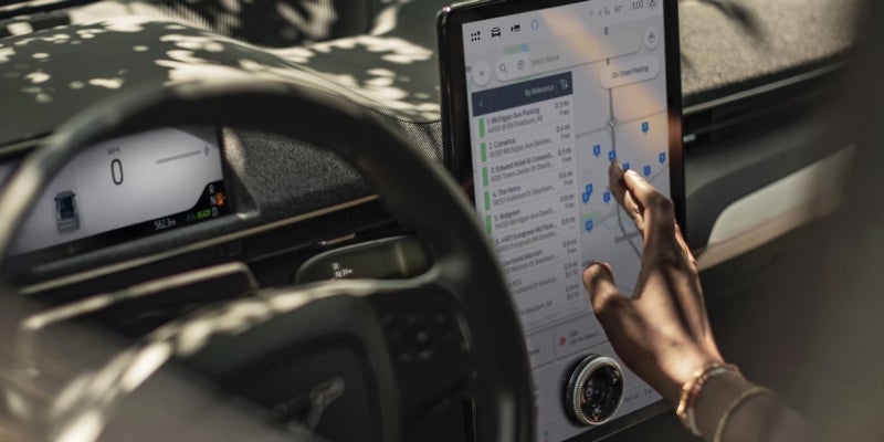 The large infotainment screen available in the 2025 Ford Mustang Mach-E in New Hudson, MI