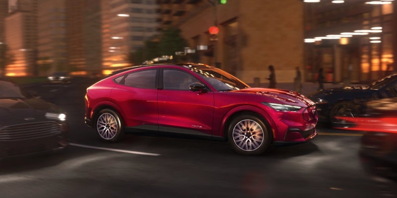 The night driving engine power of the 2025 Ford Mustang Mach-E in New Hudson, MI