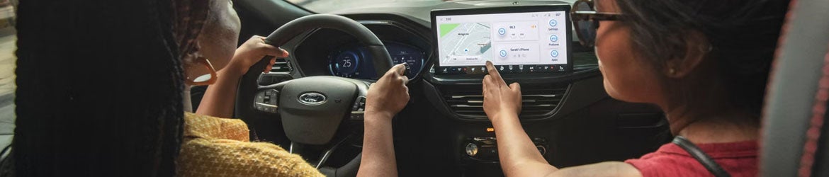 2026 Ford Escape infotainment system in New Hudson, MI with 13.2-inch touchscreen, navigation, and wireless connectivity