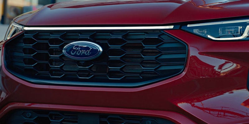 2026 Ford Escape front grille in New Hudson, MI highlighting black exterior accents and signature Ford styling