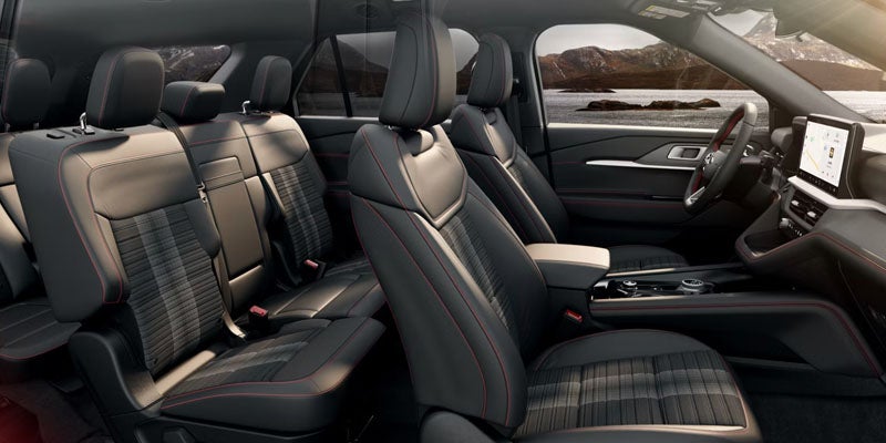 2026 Ford Explorer cabin in New Hudson, MI with seating for seven, spacious cargo area, and twin-panel moonroof