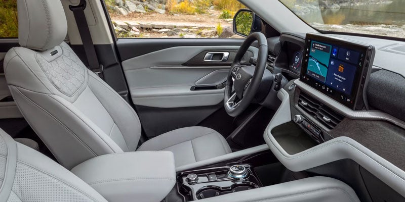 2026 Ford Explorer interior in New Hudson, MI with 13.2-inch touchscreen, digital cluster, wireless Apple CarPlay, and Android Auto