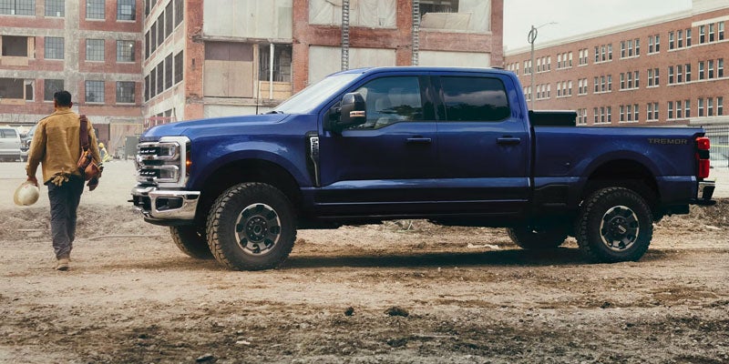 2026 Ford Super Duty trim levels in New Hudson MI featuring XL, XLT, Lariat, King Ranch, Platinum, and Platinum Plus model lineup