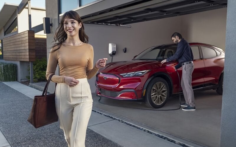 Ford Mustang Mach-E charging in garage at at-home charging station